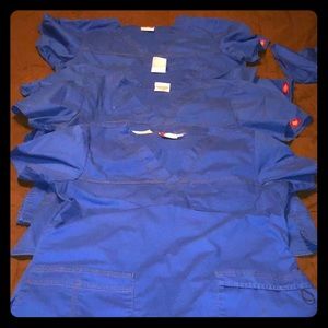 Gently used Dickies scrub tops in Royal Blue